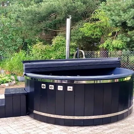 With Pool And Sauna, Holiday home *